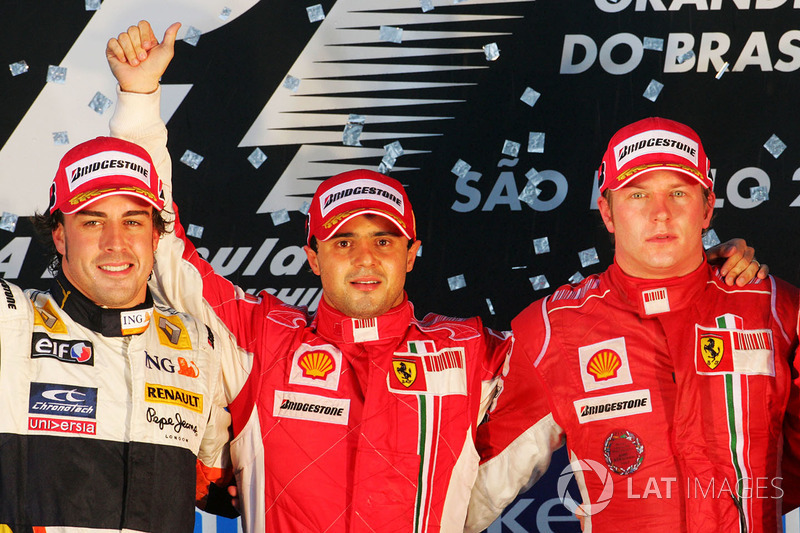 Podium: race winner Felipe Massa, Ferrari, second place Fernando Alonso, Renault and third place Kim