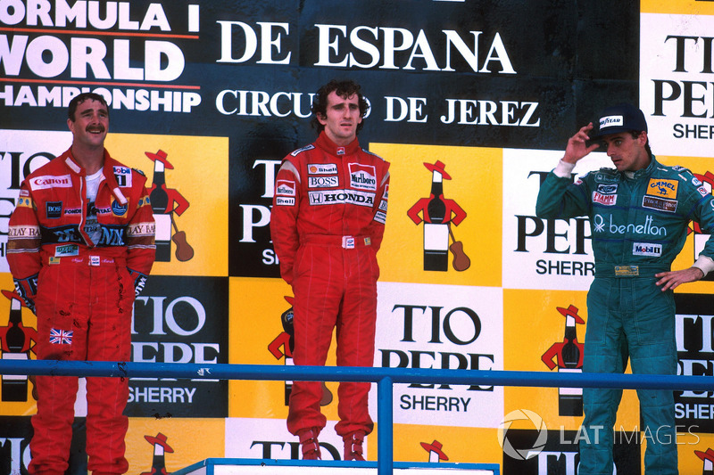 Podium : le vainqueur Alain Prost, McLaren, le deuxième Nigel Mansell, Williams, le troisième Alessandro Nannini, Benetton