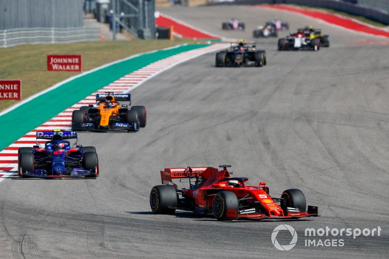 Sebastian Vettel, Ferrari SF90, Pierre Gasly, Toro Rosso STR14, Carlos Sainz Jr., McLaren MCL34, Kevin Magnussen, Haas VF-19