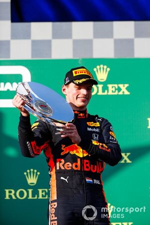 Max Verstappen, Red Bull Racing celebrates on the podium with the trophy