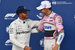 Lewis Hamilton, Mercedes AMG F1 and Esteban Ocon, Racing Point Force India F1 Team celebrate in parc ferme