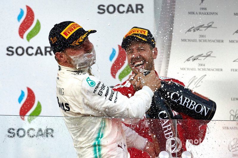 Valtteri Bottas, Mercedes AMG F1 y Sebastian Vettel, Ferrari