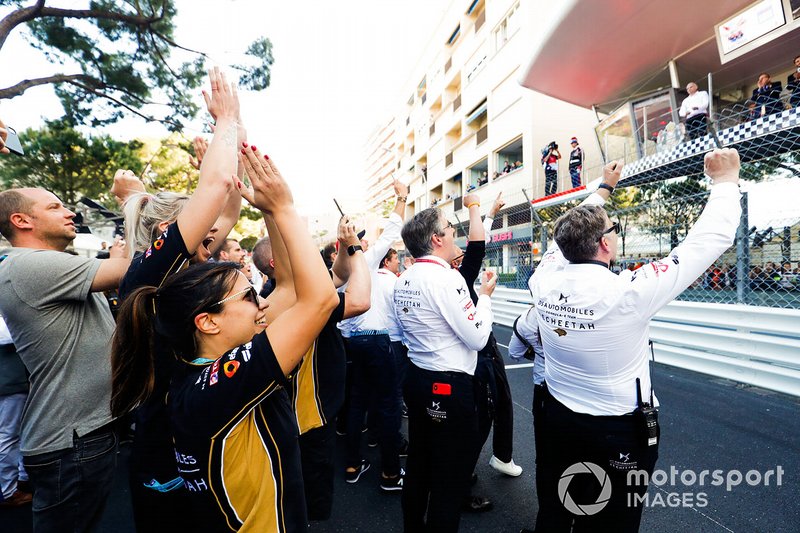 The DS TECHEETAH team celebrate victory below the podium