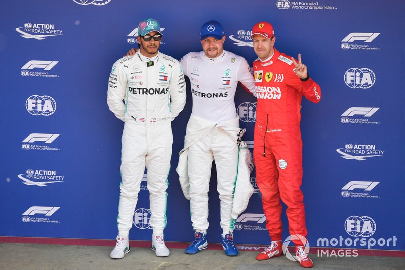 Top three Qualifiers Lewis Hamilton, Mercedes AMG F1, pole man Valtteri Bottas, Mercedes AMG F1, and Sebastian Vettel, Ferrari
