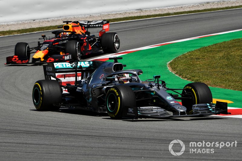 Lewis Hamilton, Mercedes AMG F1 W10, leads Max Verstappen, Red Bull Racing RB15