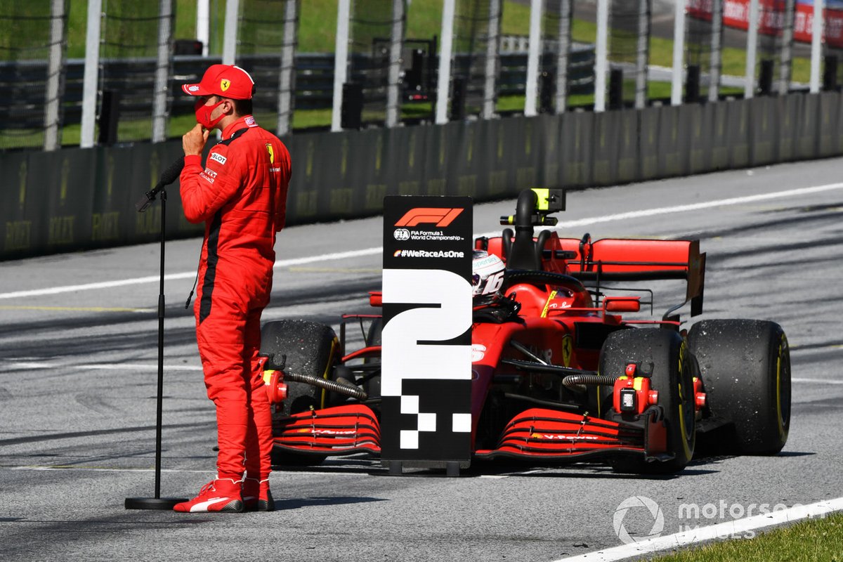 Charles Leclerc, Ferrari, talks to the media after the race