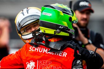 Helio Castroneves hugs Mick Schumacher