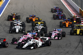 Charles Leclerc, Sauber C37, leads Esteban Ocon, Racing Point Force India VJM11, Sergio Perez, Racing Point Force India VJM11, Sergey Sirotkin, Williams FW41, Marcus Ericsson, Sauber C37, Carlos Sainz Jr., Renault Sport F1 Team R.S. 18, Nico Hulkenberg, Renault Sport F1 Team R.S. 18, Fernando Alonso, McLaren MCL33, and the remainder of the field at the start of the race
