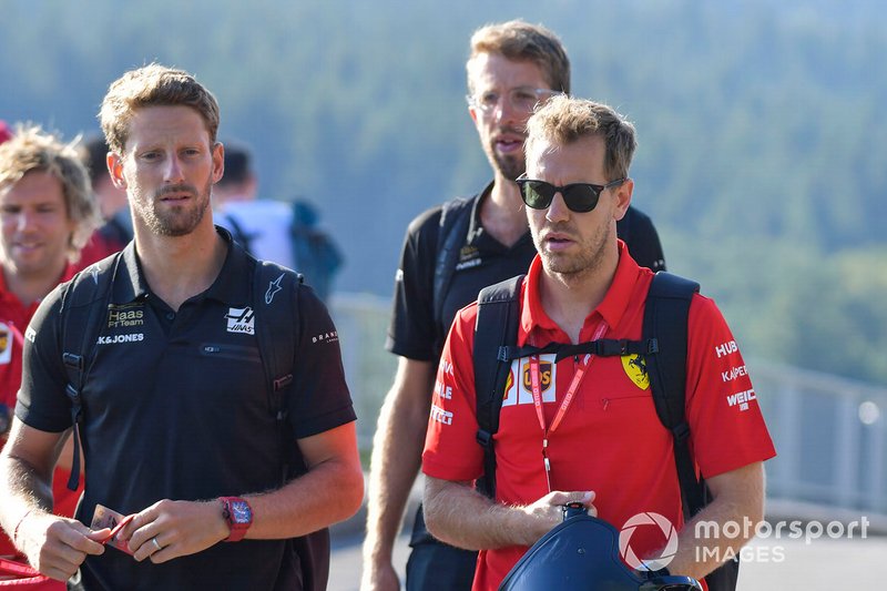 Romain Grosjean, Haas F1, e Sebastian Vettel, Ferrari
