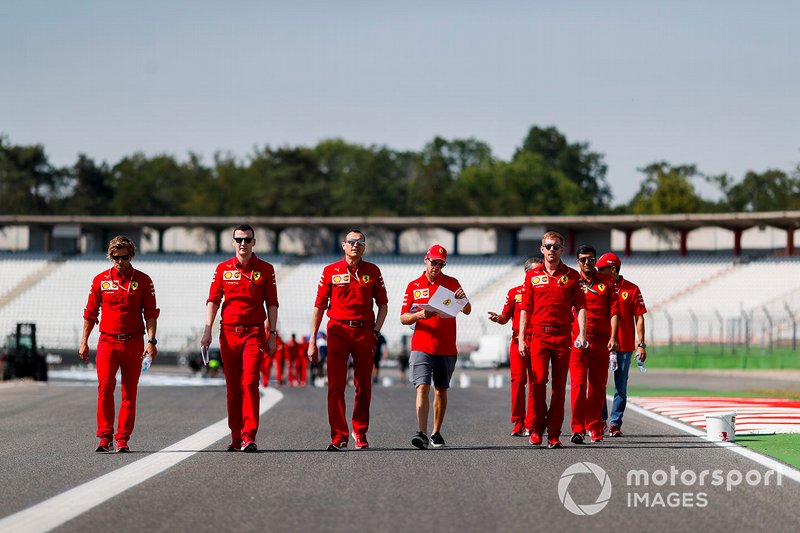 Sebastian Vettel, Ferrari walks the track with his mechanics