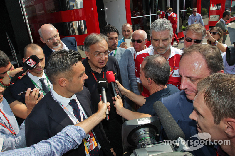 (L to R): Sergio Marchionne, Ferrari President and CEO of Fiat Chrysler Automobiles with Maurizio Ar