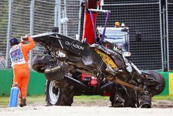 The McLaren MP4-31 of Fernando Alonso, McLaren is removed from the gravel trap after his race stopping crash