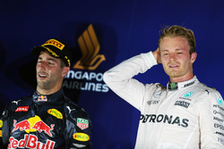 The podium (L to R): second placed Daniel Ricciardo, Red Bull Racing and race winner Nico Rosberg, M