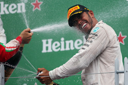 Race winner Lewis Hamilton, Mercedes AMG F1 celebrates on the podium