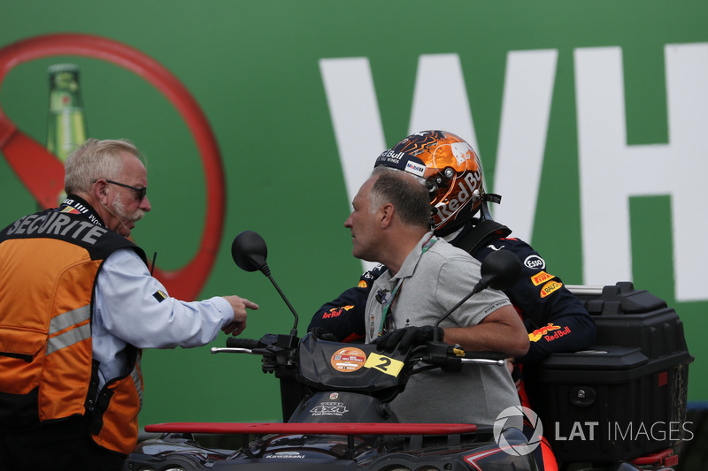 Race retiree Max Verstappen, Red Bull Racing, Race Marshals and Security after stopping on track