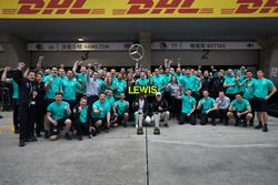 Lewis Hamilton, Mercedes AMG, celebrates victory with Valtteri Bottas, Mercedes AMG and team members
