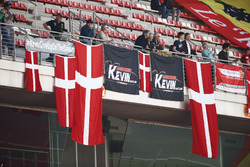 Supporters of Kevin Magnussen, Haas F1 Team, display banners and flags in the grandstand