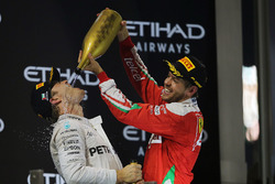 Second place Nico Rosberg, Mercedes AMG F1 celebrates his World Championship on the podium with Seba