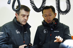 Yusuke Hasegawa, Honda Senior Managing Officer talks to a colleague
