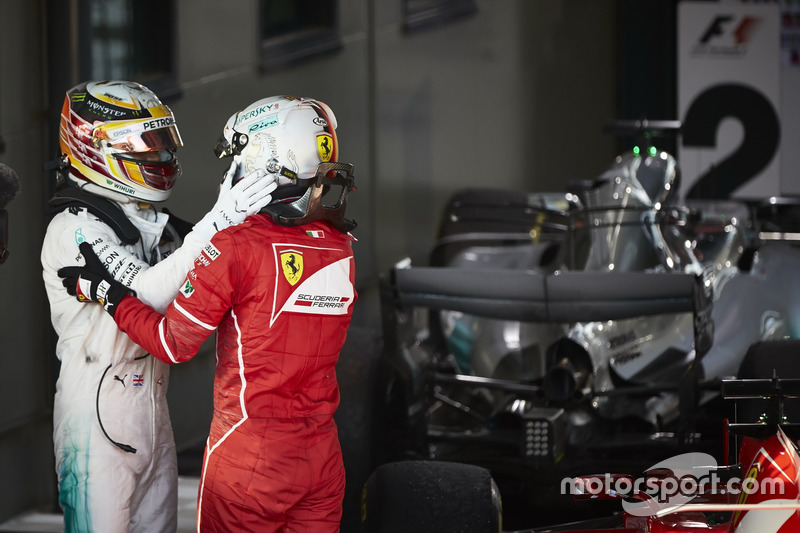 Sebastian Vettel, Ferrari, 1st Position, and Lewis Hamilton, Mercedes AMG, 2nd Position, congratulate each other in Parc Ferme