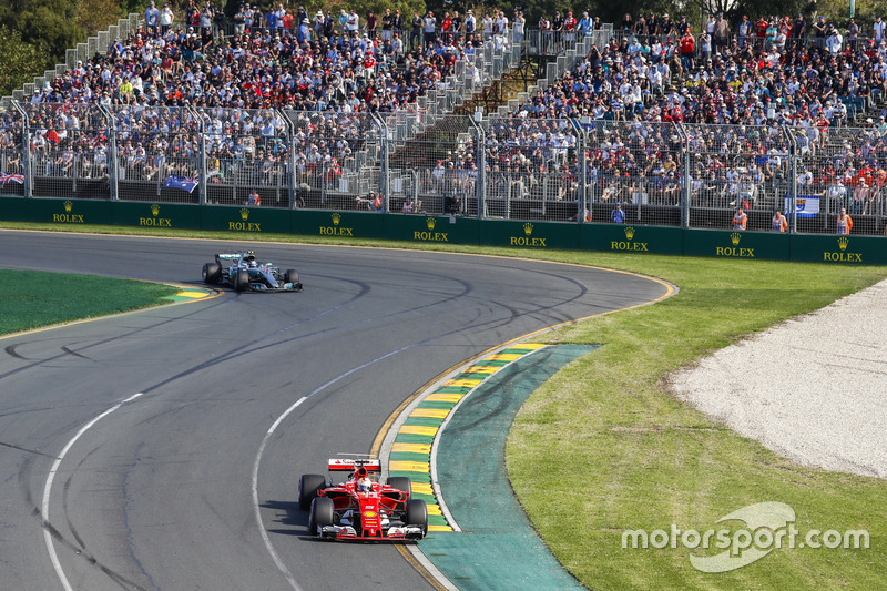 Sebastian Vettel, Ferrari SF70H, leads Valtteri Bottas, Mercedes AMG F1 W08