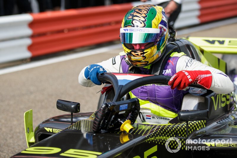 Beitske Visser celebrates in Parc Ferme after winning the race