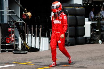 Sebastian Vettel, Ferrari walks back to his garage after crashing