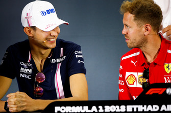Esteban Ocon, Racing Point Force India, en Sebastian Vettel, Ferrari