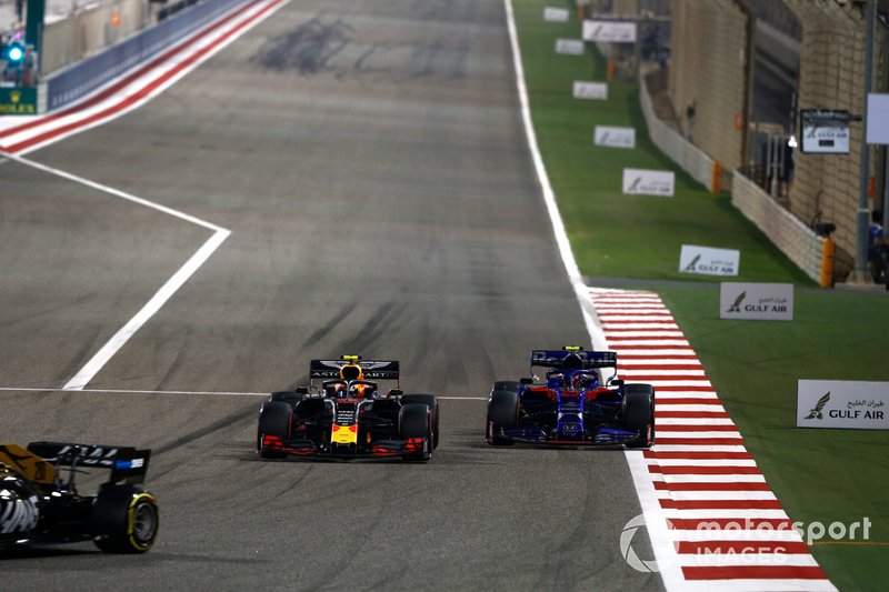 Kevin Magnussen, Haas F1 Team VF-19, leads Pierre Gasly, Red Bull Racing RB15, and Alexander Albon, Toro Rosso STR14