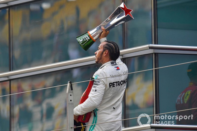 Lewis Hamilton, Mercedes AMG F1, 1st position, with his trophy and Champagne