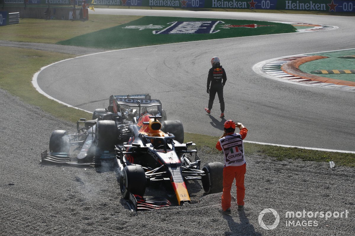 Max Verstappen, Red Bull Racing, walks away after crashing out with Lewis Hamilton, Mercedes