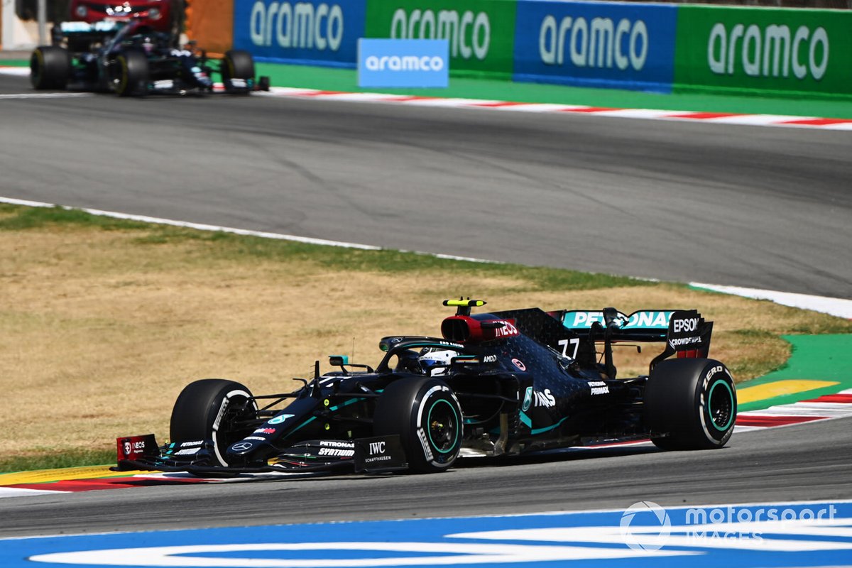 Valtteri Bottas, Mercedes F1 W11 EQ Performance, leads Lewis Hamilton, Mercedes F1 W11 EQ Performance