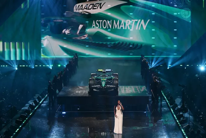 Tems performs in front of the Aston Martin Racing AMR25