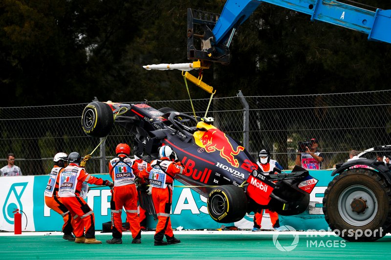 Car of Alex Albon, Red Bull RB15 being recovered after crashing in FP2