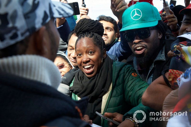 Lewis Hamilton, Mercedes AMG F1, signs autographs for fans