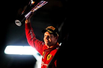 Race winner Sebastian Vettel, Ferrari, with his trophy
