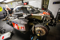 #4 ByKolles Racing CLM P1/01: team members at work to repair damage sustained in free practice