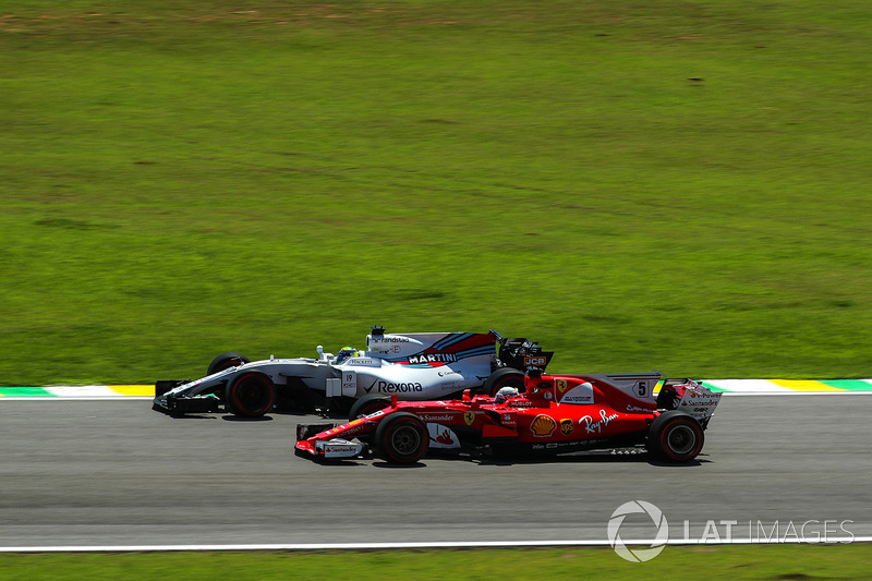 Sebastian Vettel, Ferrari SF70H and Felipe Massa, Williams FW40