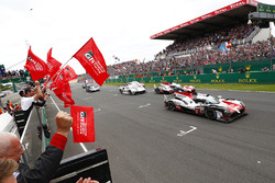 #8 Toyota Gazoo Racing Toyota TS050: Sébastien Buemi, Kazuki Nakajima, Fernando Alonso, #7 Toyota Gazoo Racing Toyota TS050: Mike Conway, Kamui Kobayashi, Jose Maria Lopez cross the finish line