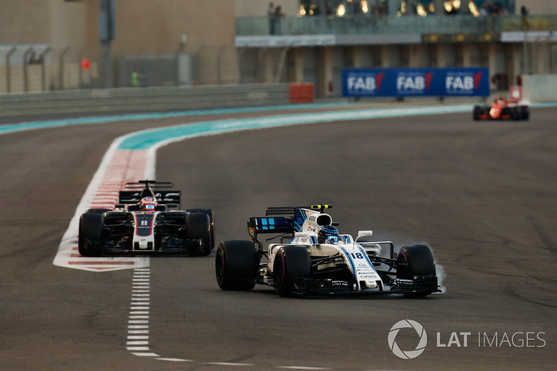 Lance Stroll, Williams FW40, Romain Grosjean, Haas F1 Team VF-17