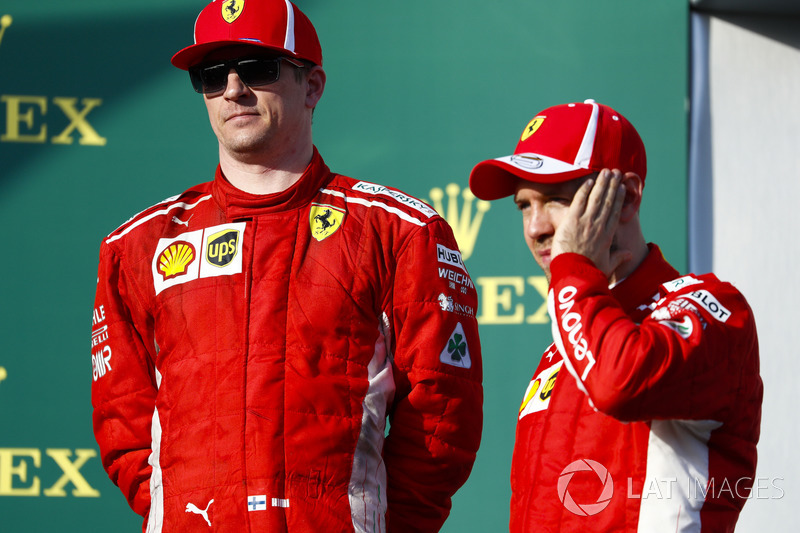 Гонщики Ferrari Кими Райкконен и Себастьян Феттель