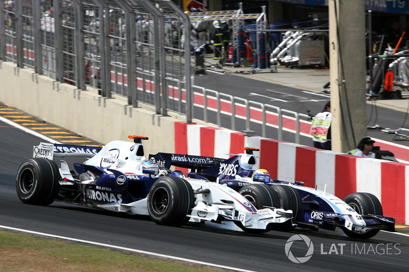 Nick Heidfeld, BMW Sauber F1.07 junto a Nico Rosberg, Williams FW29