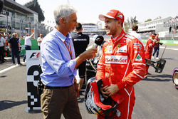 Damon Hill interviews pole position winner Sebastian Vettel, Ferrari