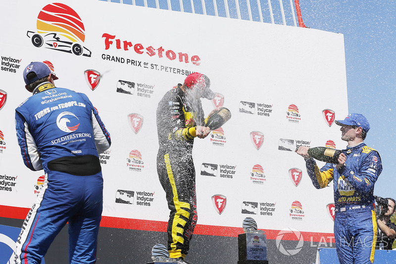 Sébastien Bourdais, Dale Coyne Racing with Vasser-Sullivan Honda, Graham Rahal, Rahal Letterman Lanigan Racing Honda, Alexander Rossi, Andretti Autosport Honda celebrate with champagne on the podium