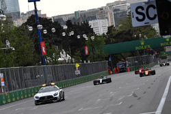 Safety car leads the field