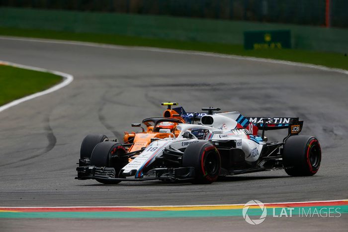 Lance Stroll, Williams FW41, y Stoffel Vandoorne, McLaren MCL33
