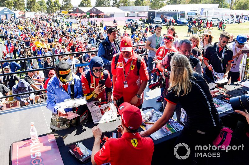 Sebastian Vettel, Ferrari, signs autographs for fans