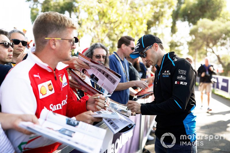 Robert Kubica, Williams Racing, signs autographs for fans