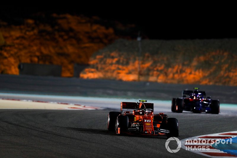 Charles Leclerc, Ferrari SF90, leads Alexander Albon, Toro Rosso STR14