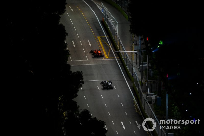 Sebastian Vettel, Ferrari SF90, leads Valtteri Bottas, Mercedes AMG W10